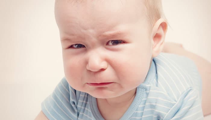 Eight month old baby crying